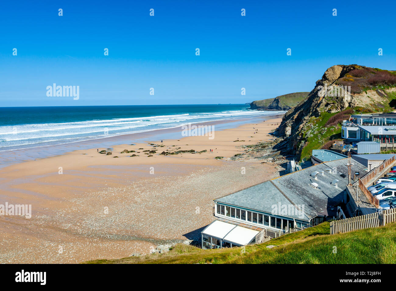 On the coast path overlooking the golden sandy beach at Watergate Bay near Newquay Cornwall England UK Europe Stock Photo