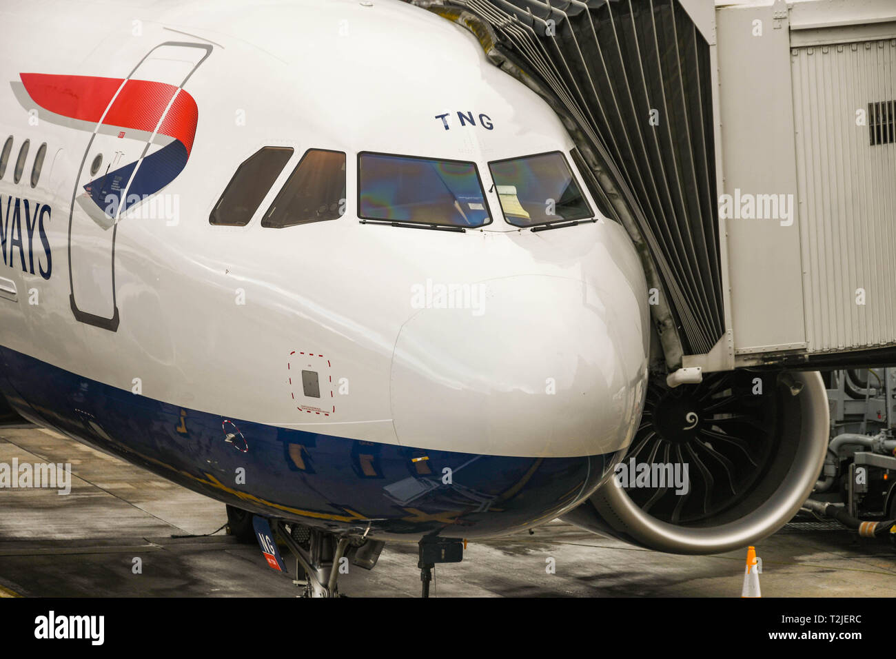 LONDON HEATHROW AIRPORT, ENGLAND - FEBRUARY 2019:  Close up of the nose of a new British Airways Airbus A320 Neo short-haul jet Stock Photo