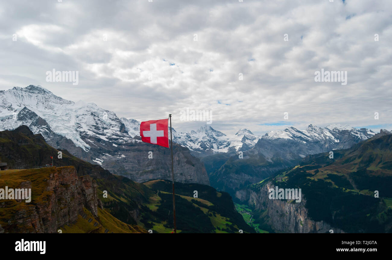 swiss-flag-in-the-alps-stock-photo-alamy