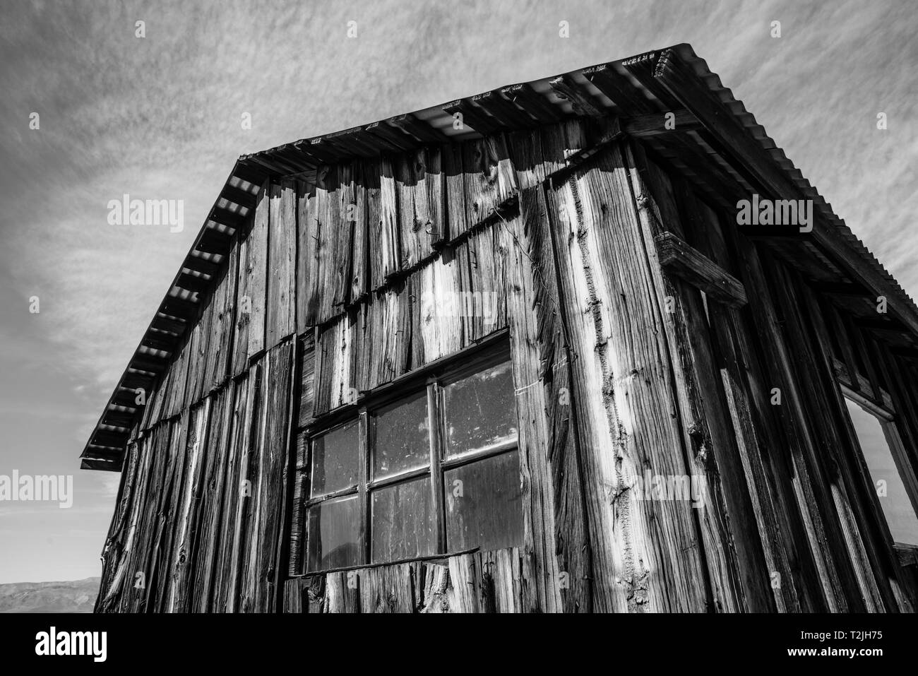 The exterior of a weathered cabin in the mojave desert near Death Valley. Stock Photo