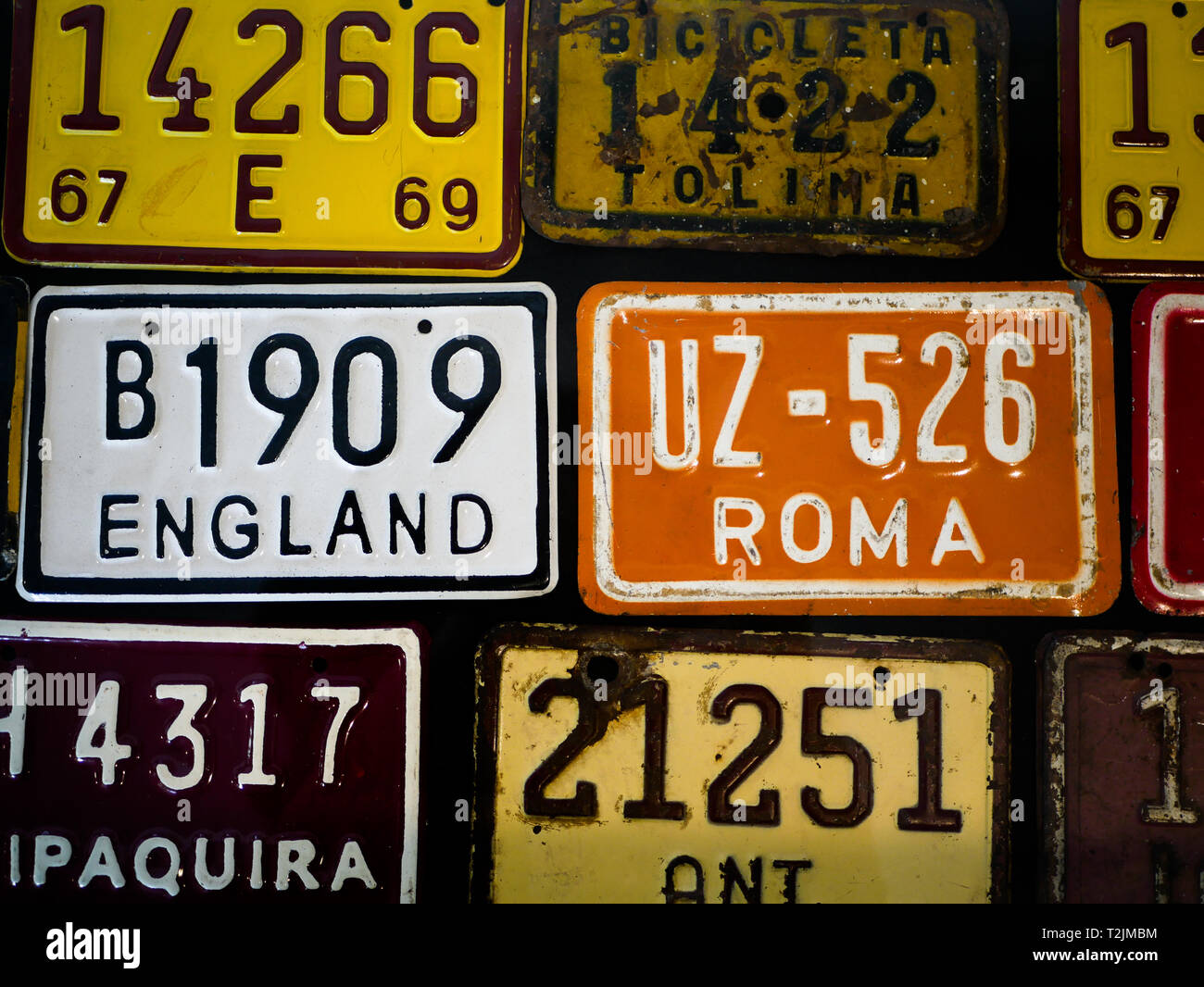 close up of the a collection of a licence plates for bicycles during an  expo museo el castillo medellin colombia Stock Photo - Alamy