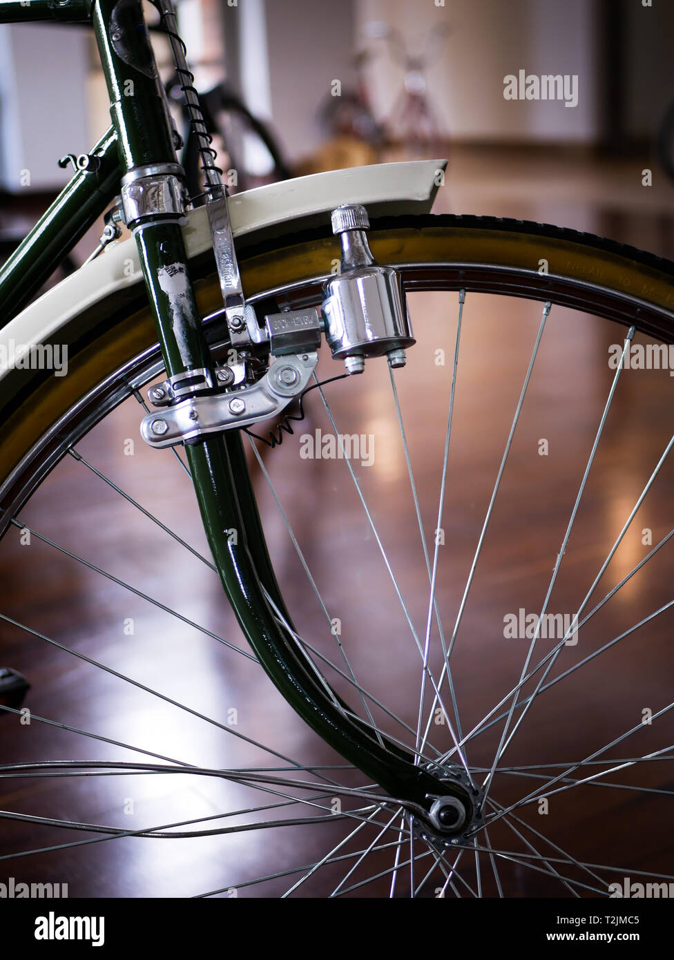 details of a front Wheel of and old bycicle during an expo on the museo el castillo in medellin colombia Stock Photo