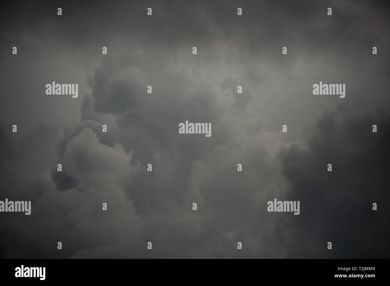 gray cotton ball storm clouds background Stock Photo