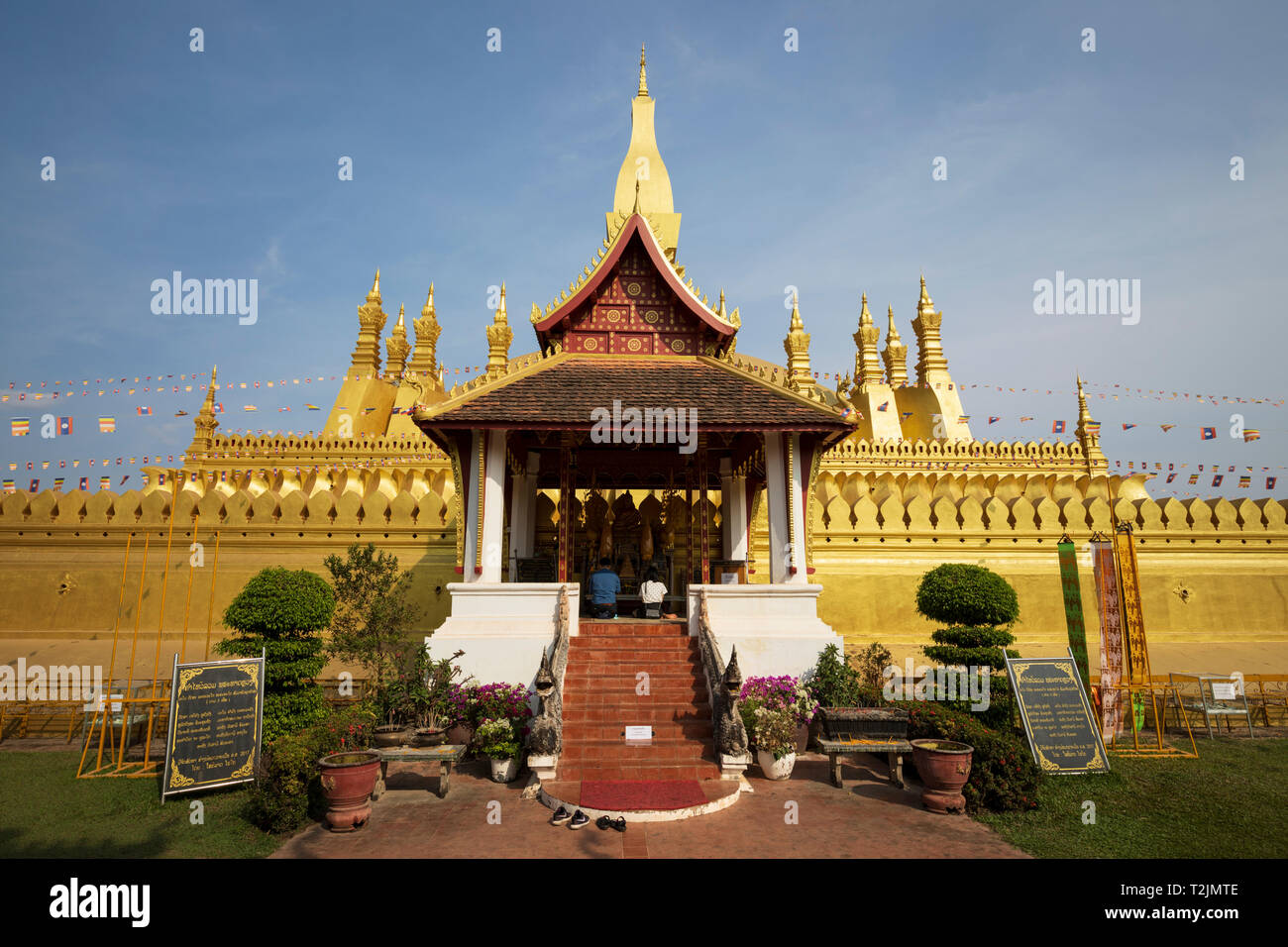 The golden Buddhist stupa of Pha That Luang, Vientiane, Laos, Southeast Asia Stock Photo