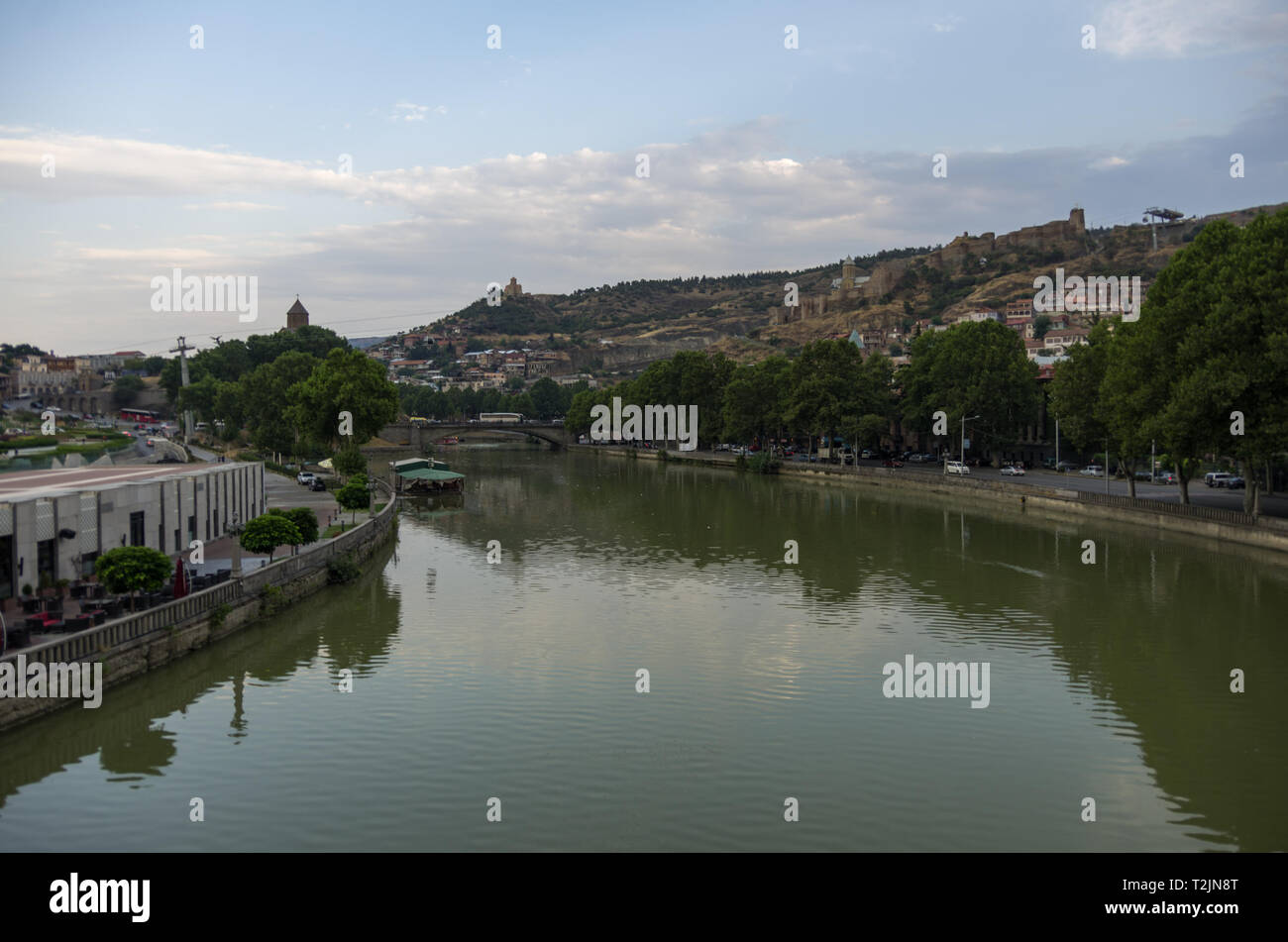View from the Bridge of Peace in Tbilisi, a pedestrian bridge over the Mtkvari River in Tbilisi, Georgia Stock Photo