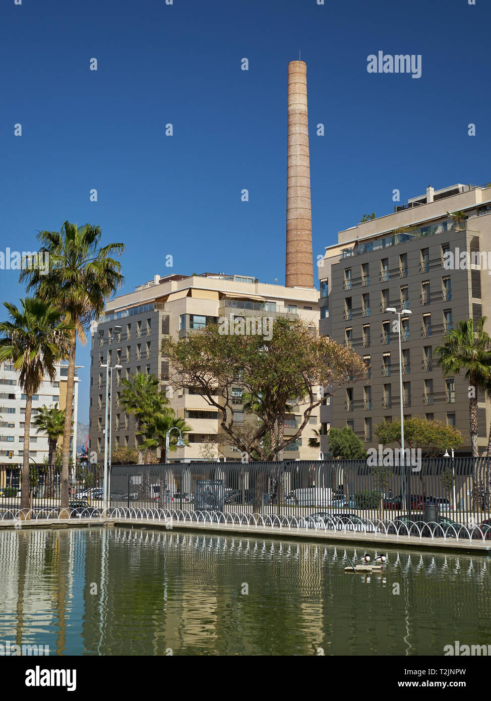 Monica´s Chimney (Chimenea Mónica - Chimenea de Los Guindos) from West park (Parque del oeste). Málaga, Andalusia, Spain. Stock Photo