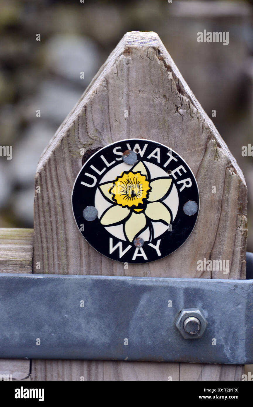 Waymarker on Wooden Post for Ullswater Way a 20 Mile Walk around the Lake at Glencoyne Bay in the Lake District National Park, Cumbria, England, UK. Stock Photo