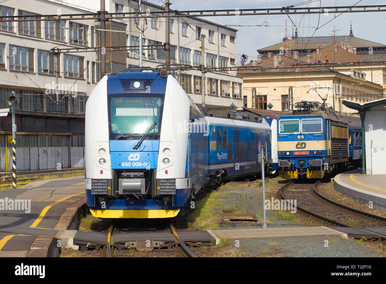BRNO, CZECH REPUBLIC APRIL 24, 2018 Two passenger trains on the main railway station on a