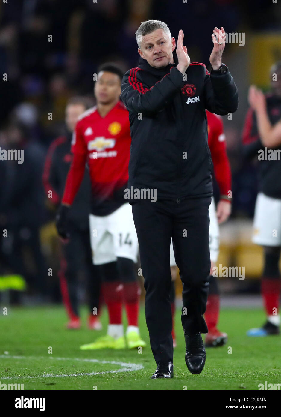 Manchester United manager Ole Gunnar Solskjaer applauds the fans after the  final whistle of the Premier League match at Molineux Stadium,  Wolverhampton Stock Photo - Alamy