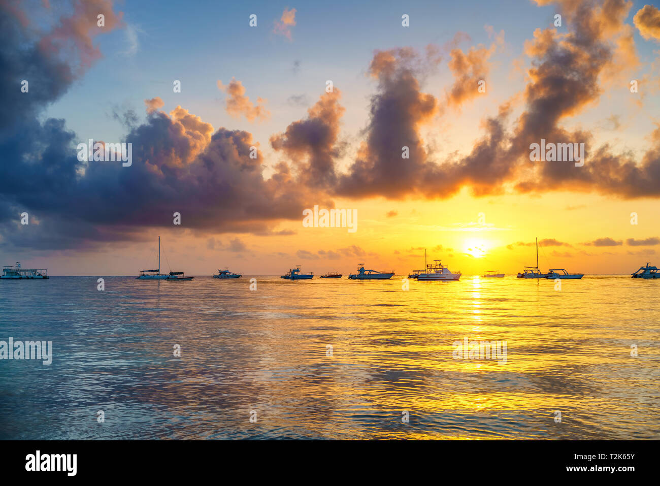 Beautiful cloudy sunrise over ocean in Dominican Republic Stock Photo