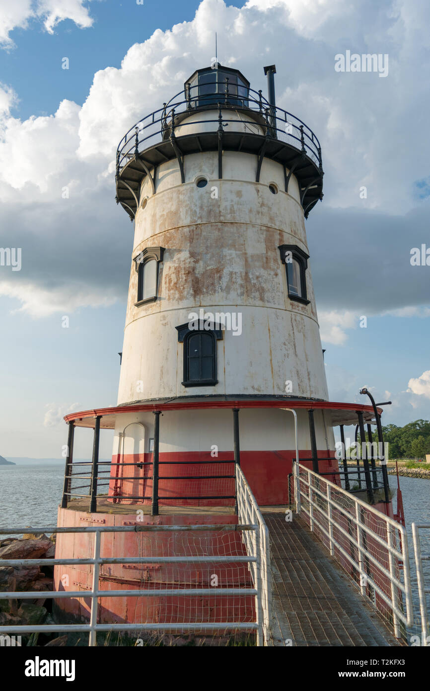 Sleepy Hollow Lighthouse on a beautiful summer's day against a blue sky with beautiful white