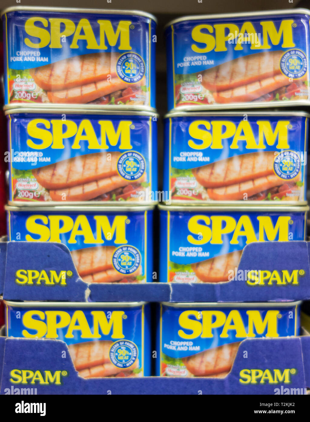 Stacked tins of Hormel Foods Spam on a supermarket shelf in London, England, UK Stock Photo