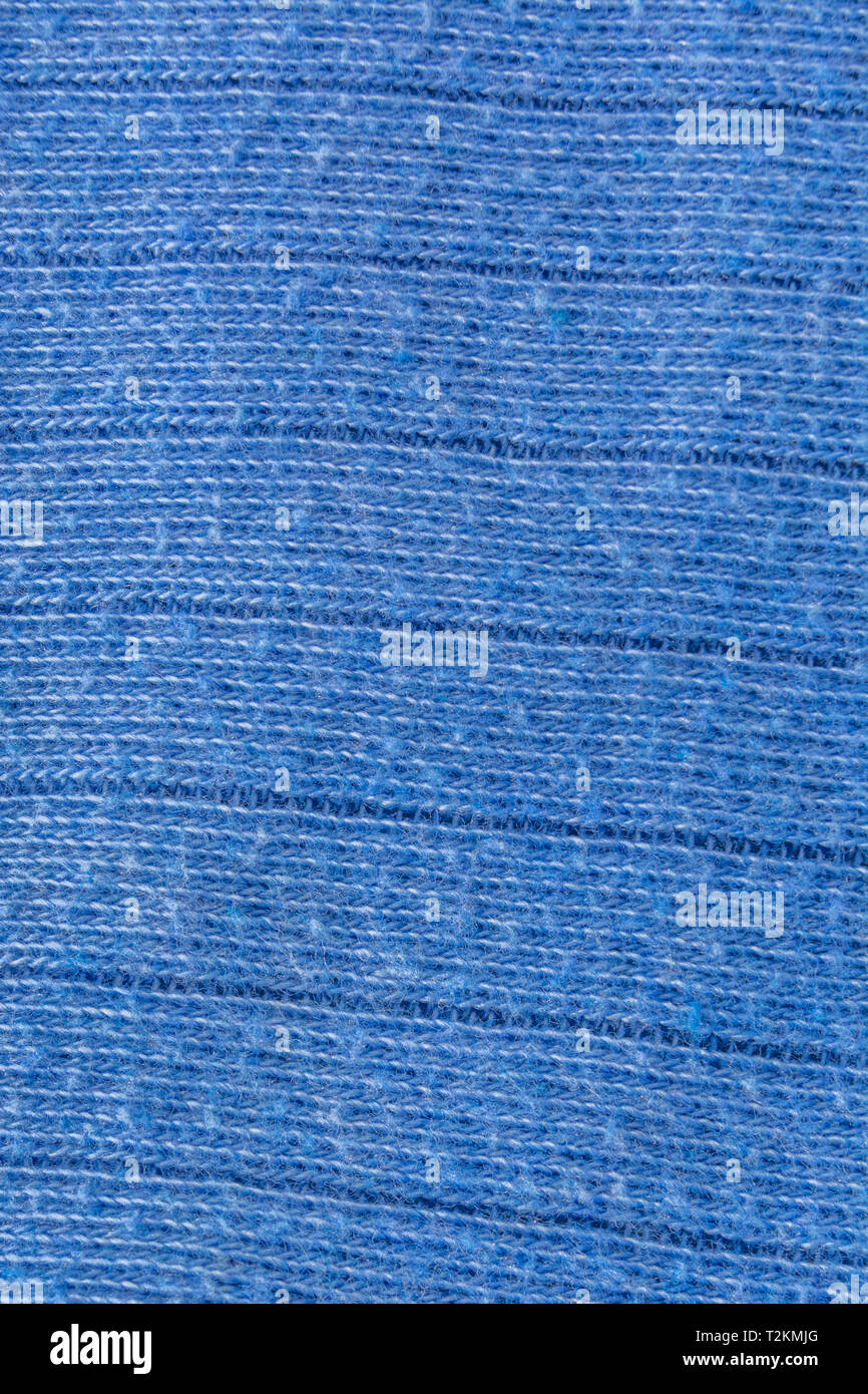 Close-up macro of woven polyester fabric which is starting to 'pill'. Stock Photo