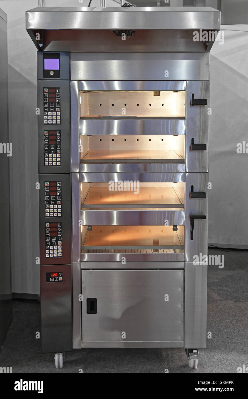https://c8.alamy.com/comp/T2KMPK/four-level-deck-oven-in-commercial-bakery-T2KMPK.jpg