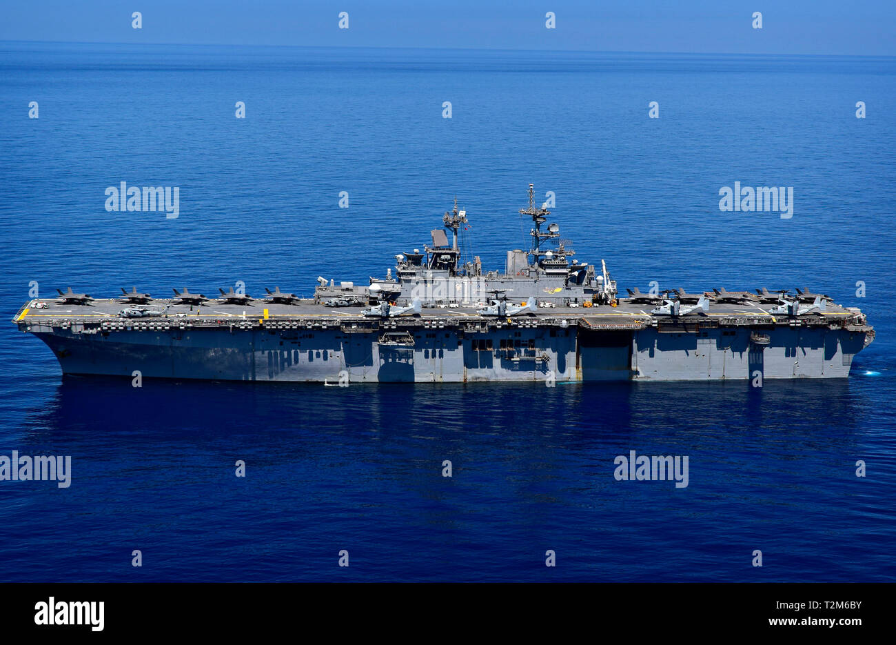 190329-N-RI884-0079 SOUTH CHINA SEA (March 29, 2019) The amphibious assault ship USS Wasp (LHD 1) transits the waters of the South China Sea. Wasp, flagship of Wasp Amphibious Ready Group, is operating in the Indo-Pacific region to enhance interoperability with partners and serve as a lethal, ready-response force for any type of contingency. (U.S. Navy photo by Mass Communication Specialist 1st Class Daniel Barker) Stock Photo