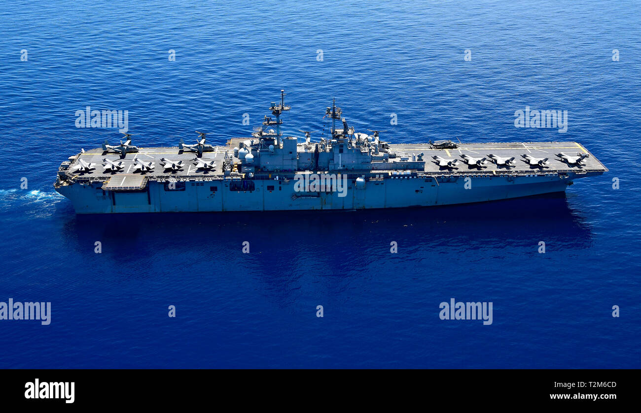 190329-N-RI884-0161 SOUTH CHINA SEA (March 29, 2019) The amphibious assault ship USS Wasp (LHD 1) transits the waters of the South China Sea. Wasp, flagship of Wasp Amphibious Ready Group, is operating in the Indo-Pacific region to enhance interoperability with partners and serve as a lethal, ready-response force for any type of contingency. (U.S. Navy photo by Mass Communication Specialist 1st Class Daniel Barker) Stock Photo