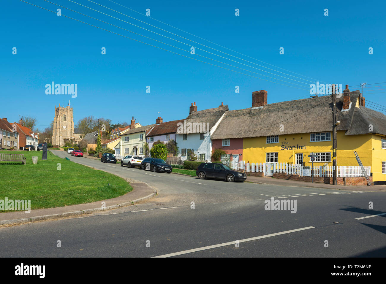 Monks Eleigh Suffolk, view across the village green towards Church Hill in Monks Eleigh, with the Swan Inn pub sited on the right, Babergh district,UK Stock Photo