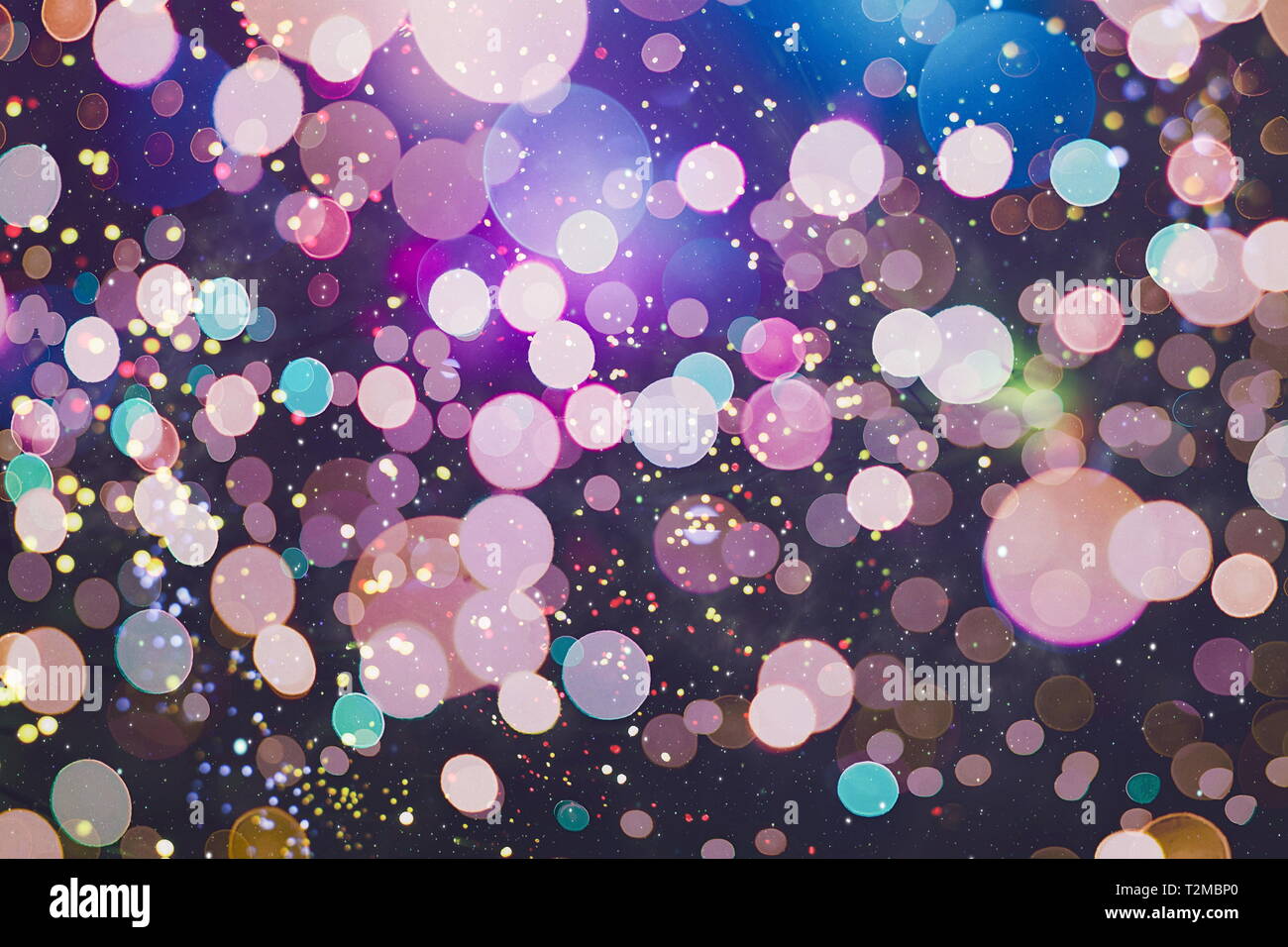 glittering shine bulbs lights background:blur of Christmas wallpaper  decorations concept.holiday festival backdrop:sparkle circle lit  celebrations dis Stock Photo - Alamy