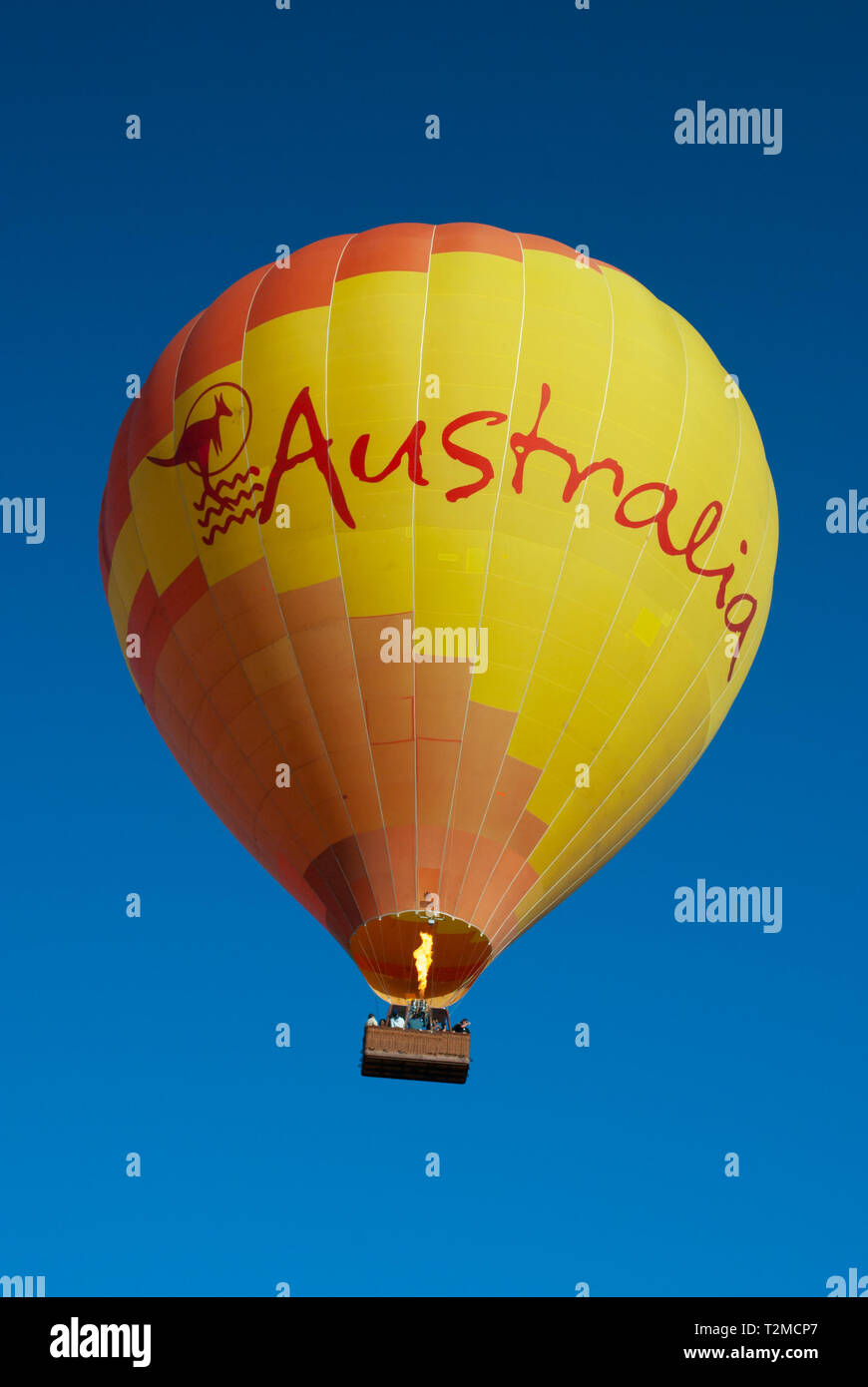 Hot air balloon set against a clear blue sky Stock Photo - Alamy