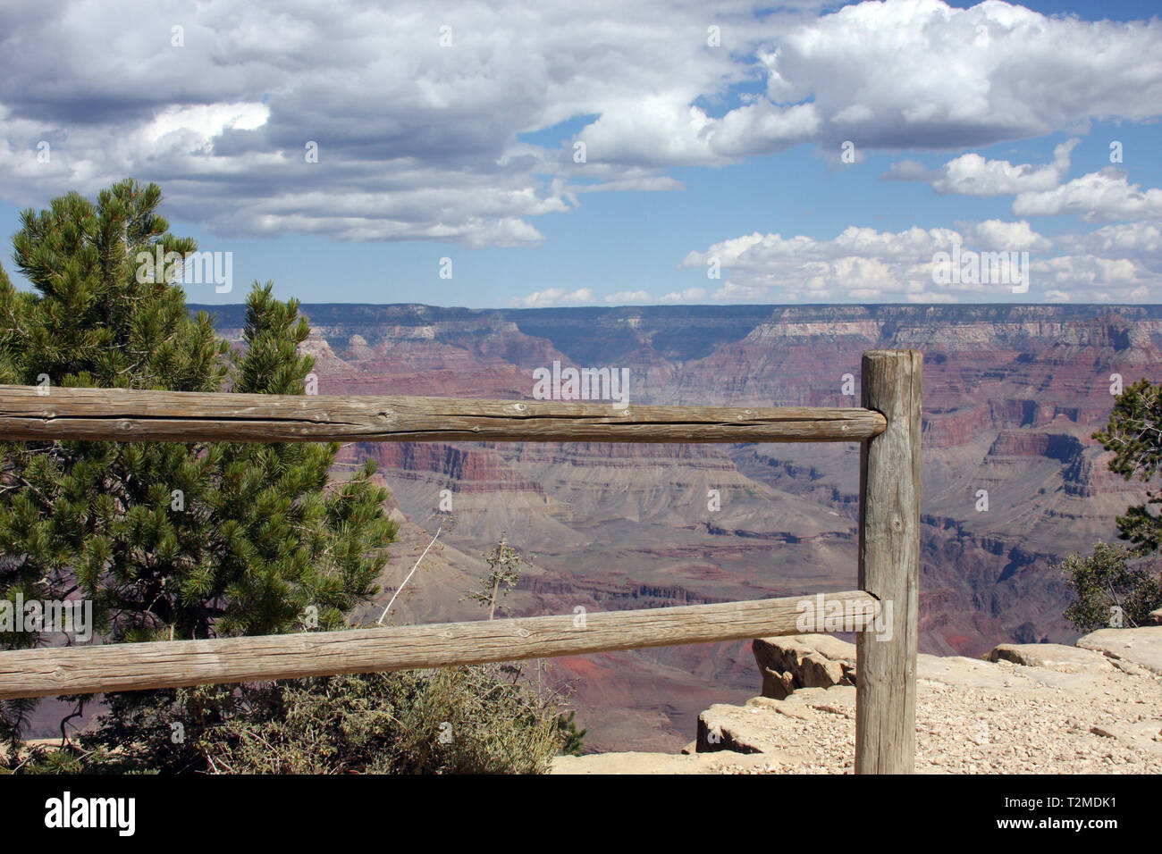 Overlook of the Grand Canyon against a blue cloudy sky Stock Photo