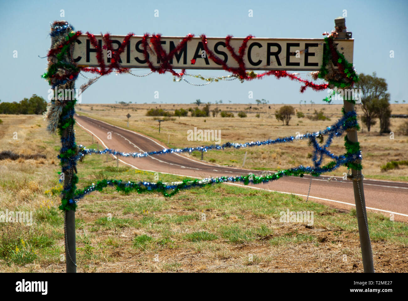 This Sign Is Decorated All Year Round Due To The Name Of The Town Christmas Creek Not Something You Expect To See In The Outback Of Australia Stock Photo Alamy