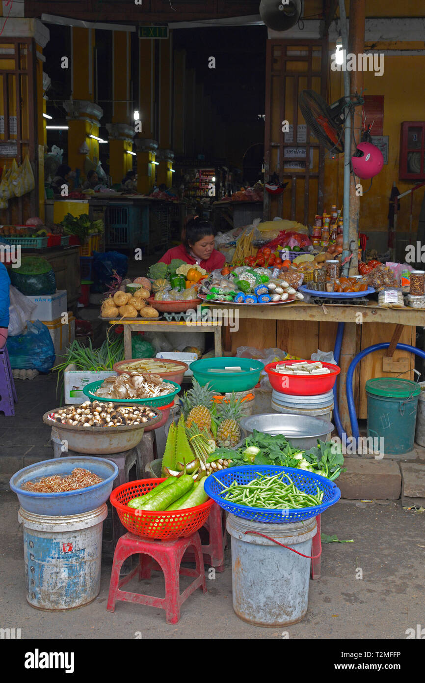 Fruit vendor waits customers market hi-res stock photography and