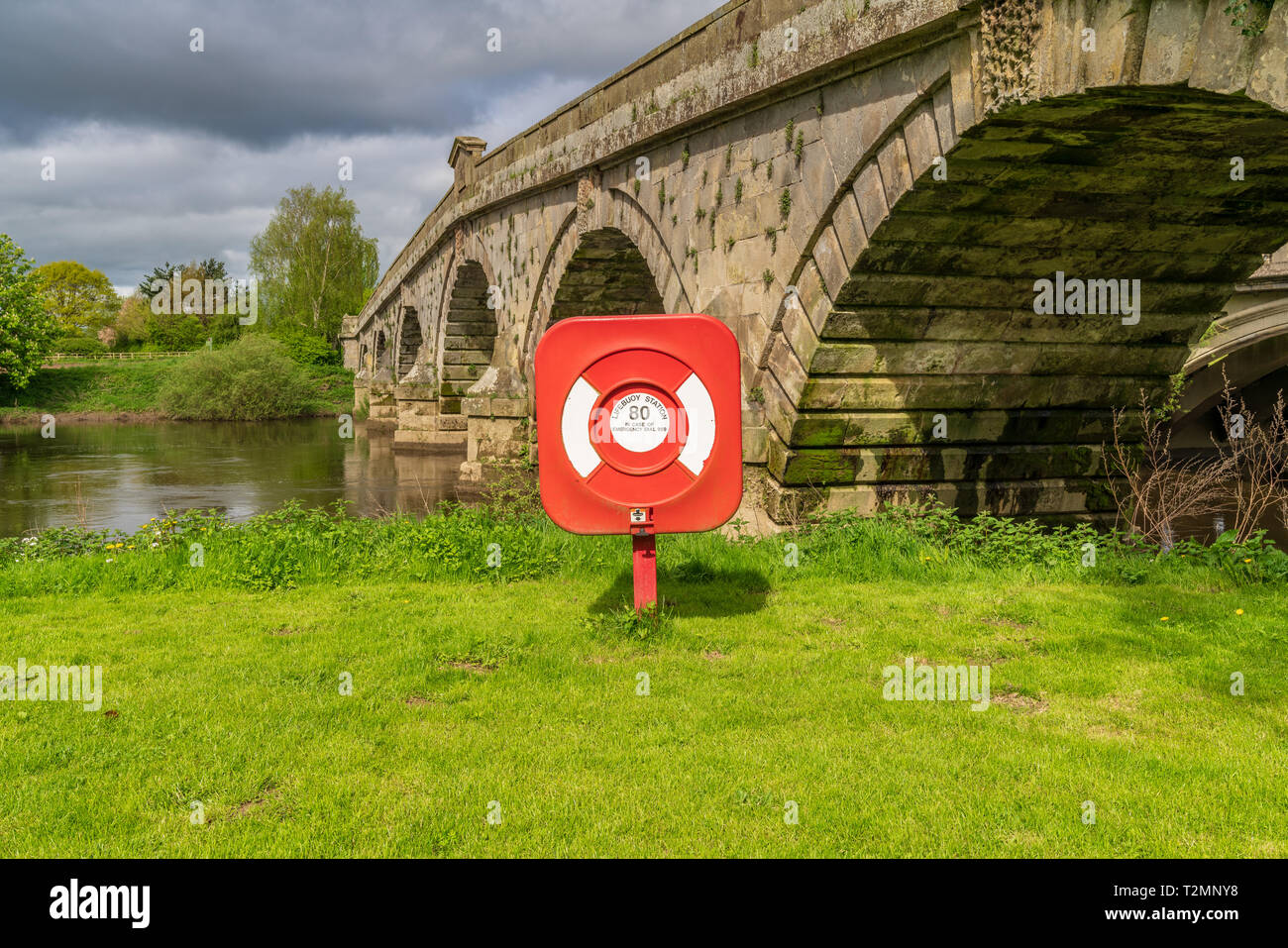 A lifebuoy at Atcham Old Bridge over the River Severn in Atcham, near ...