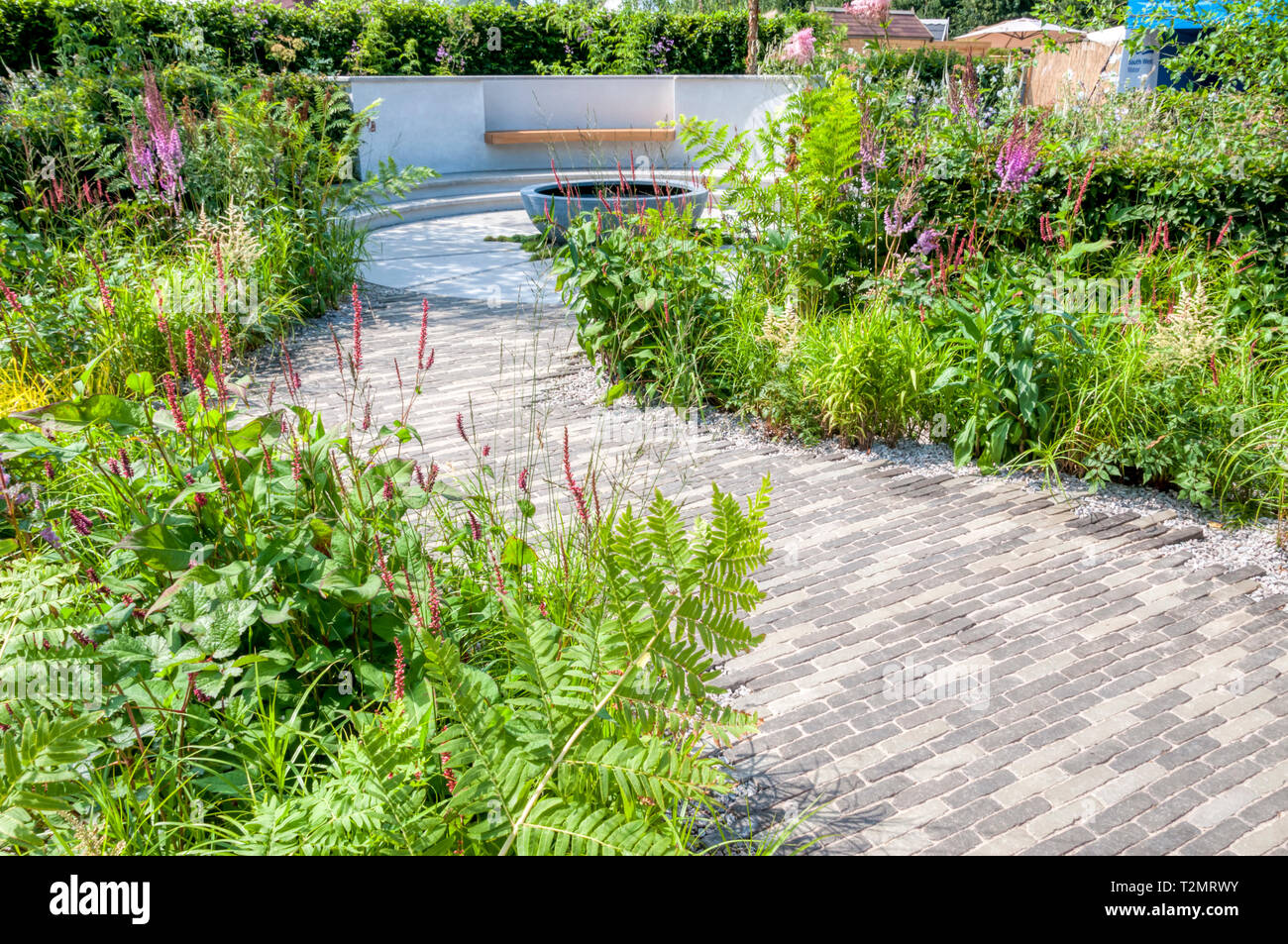 The South West Water Green Garden by Tom Simpson Garden Design at the RHS Hampton Court Palace Flower Show 2018 Stock Photo