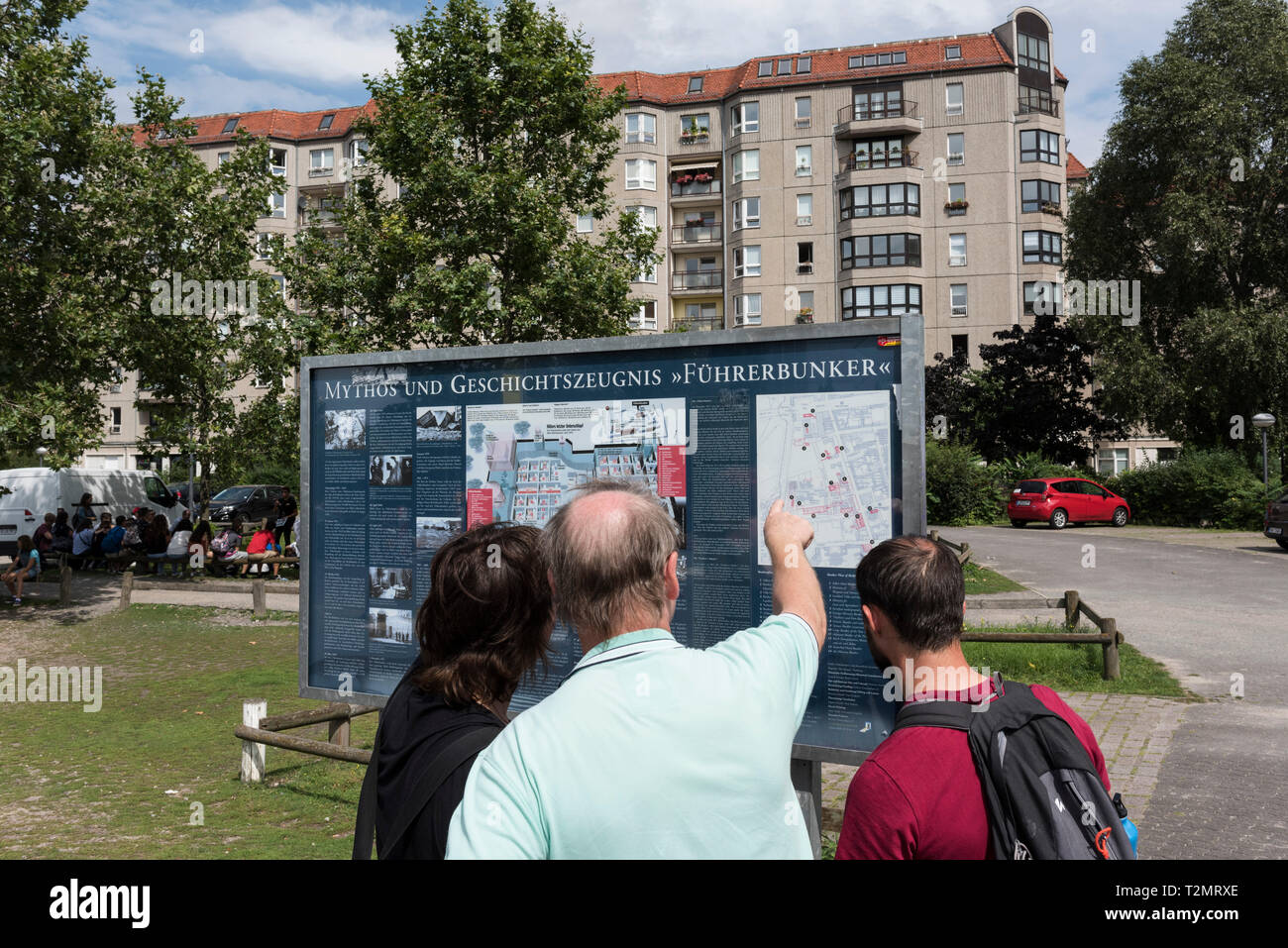 Berlin. Germany. Tourists visiting the site of Hitler's bunker (Führerbunker), where Adolf Hitler and Eva Braun comitted suicide in 1945, located at I Stock Photo