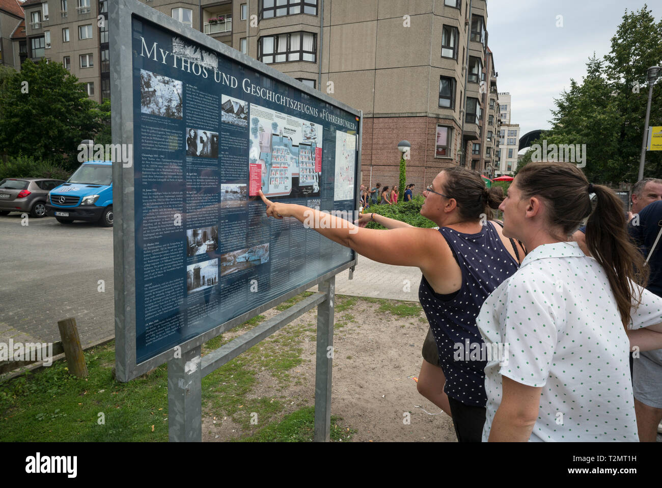 Berlin. Germany. Tourists visiting the site of Hitler's bunker (Führerbunker), where Adolf Hitler and Eva Braun comitted suicide in 1945, located at I Stock Photo