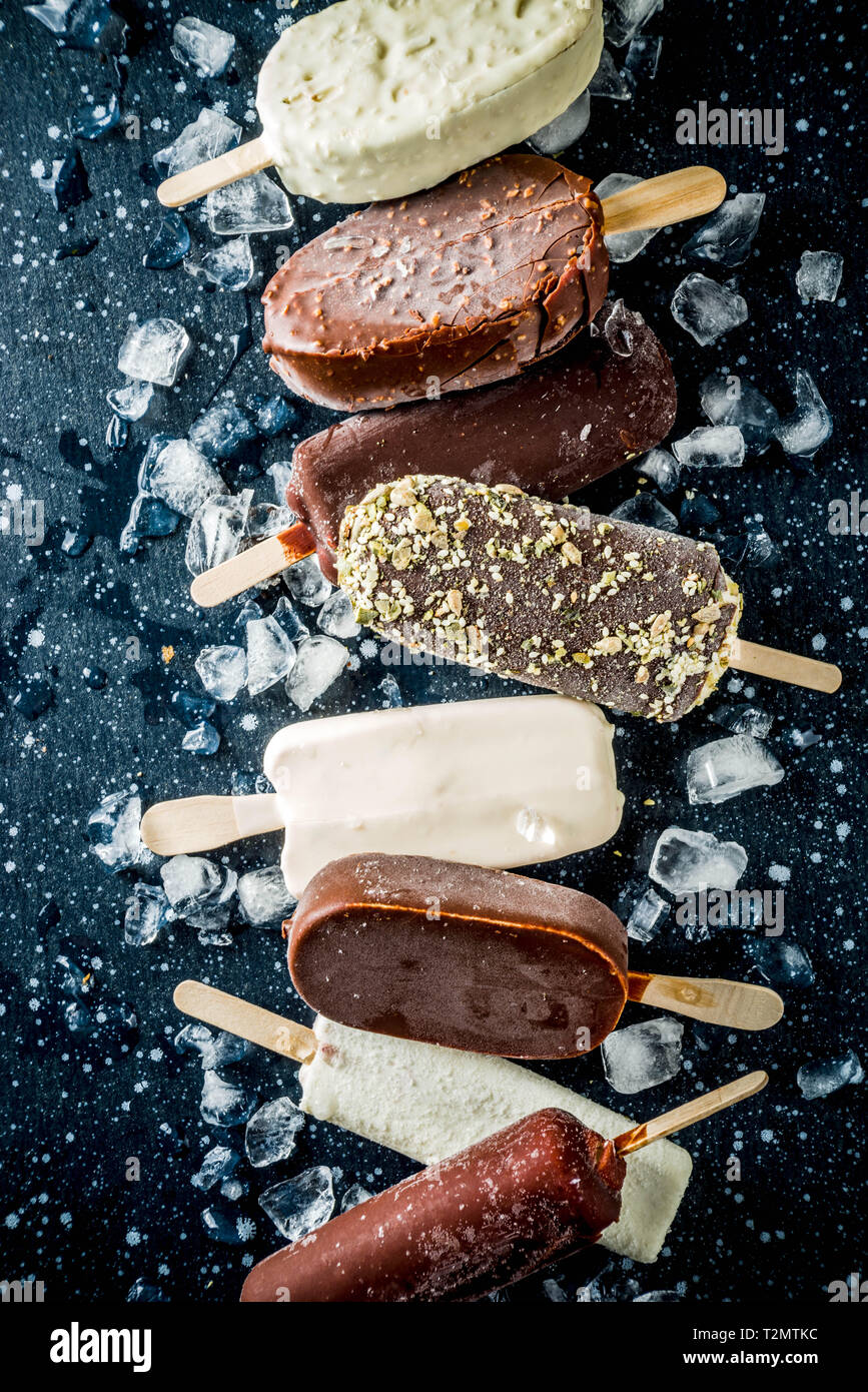 Assortment of various popsicle ice cream, vanilla and chocolate, with ...