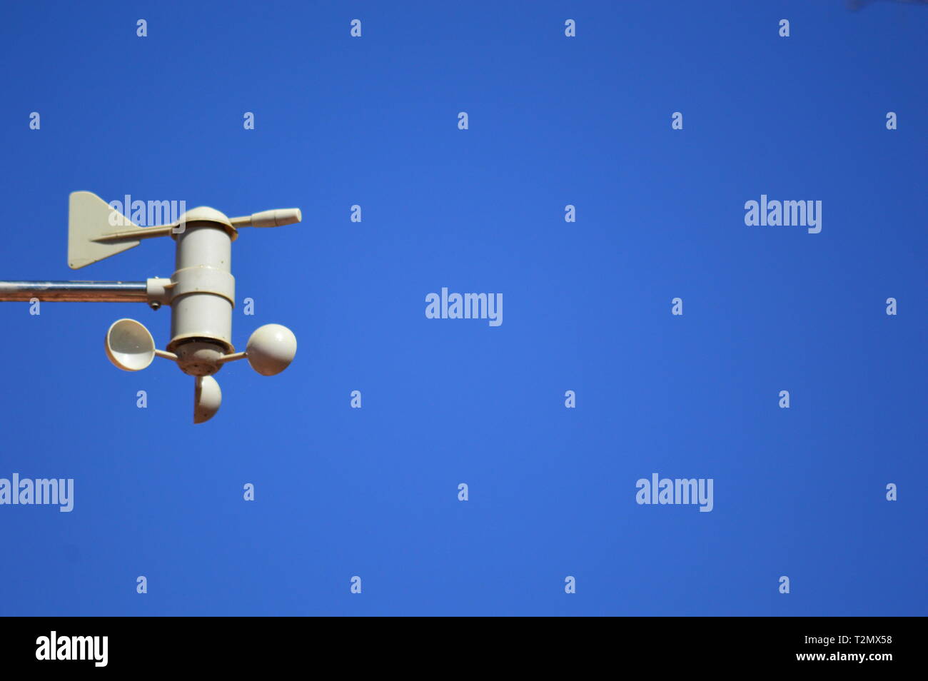 An anemometer with blue sky background Stock Photo Alamy