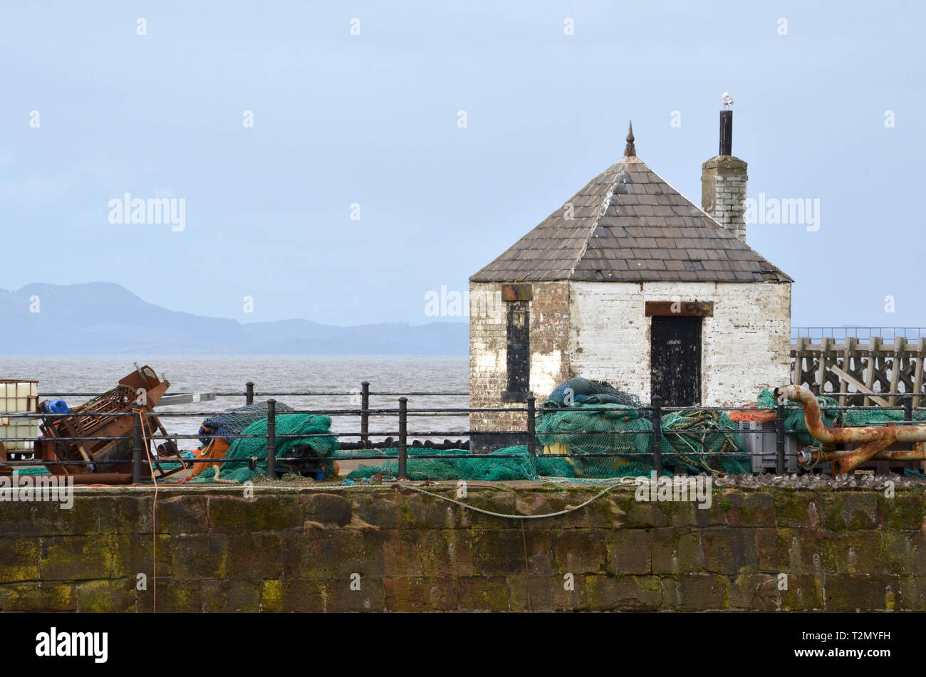 Small building on the harbour at Maryport, Cumbria, England Stock Photo