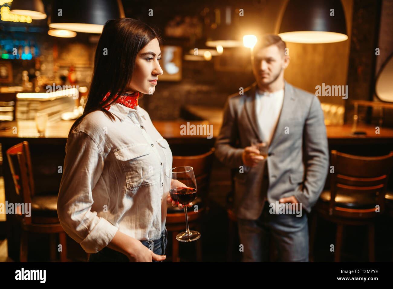 Man and woman flirting in bar hires stock photography and images Alamy