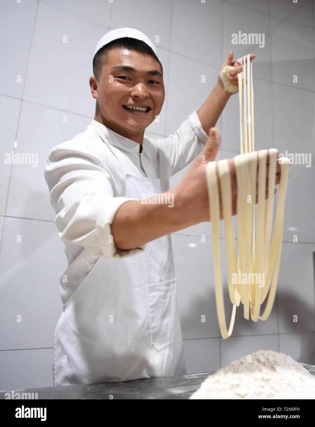 Chef pulling noodles chinese hires stock photography and images Alamy