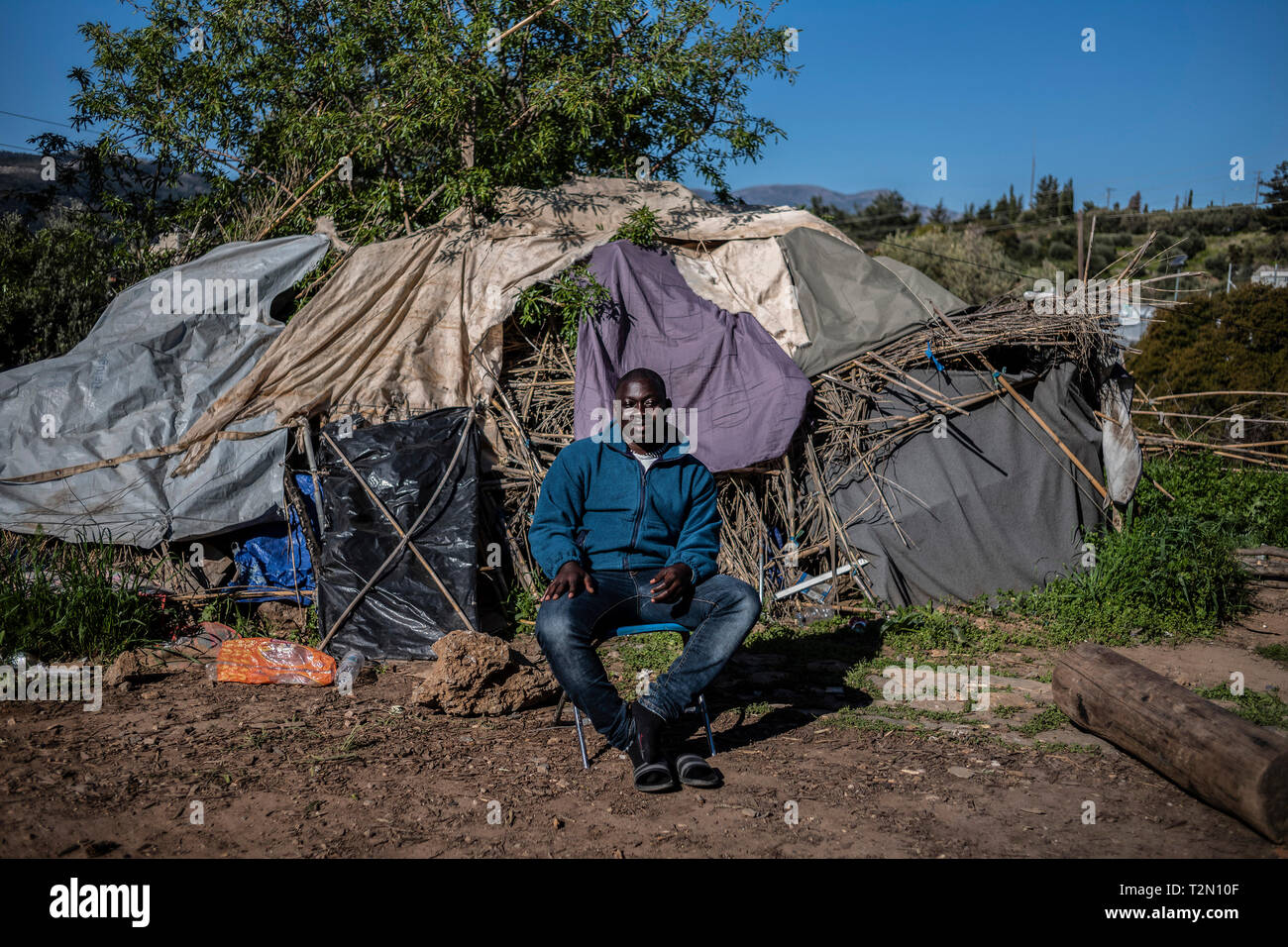 Vathy Greece 25th Mar 19 A Refugee Is Sitting In A Refugee Camp On The Greek Island Of Samos In Front Of His Tent Around 4500 Refugees And Migrants Live Here They Vathy Greece 25th Mar 19 A Refugee Is Sitting In A Refugee Camp On The Greek Island Of Samos In Front Of His Tent Around 4500 Refugees And Migrants Live Here They
