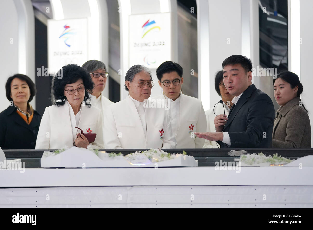 Beijing, China. 3rd Apr, 2019. Timothy Fok Tsun-ting (2nd L front), president of the Sports Federation and Olympic Committee of Hong Kong, China, visits the exhibition center of the Beijing Organizing Committee for the 2022 Olympic and Paralympic Winter Games in the Shougang Park in Shijingshan District in Beijing, capital of China, April 3, 2019. Credit: Ju Huanzong/Xinhua/Alamy Live News Stock Photo