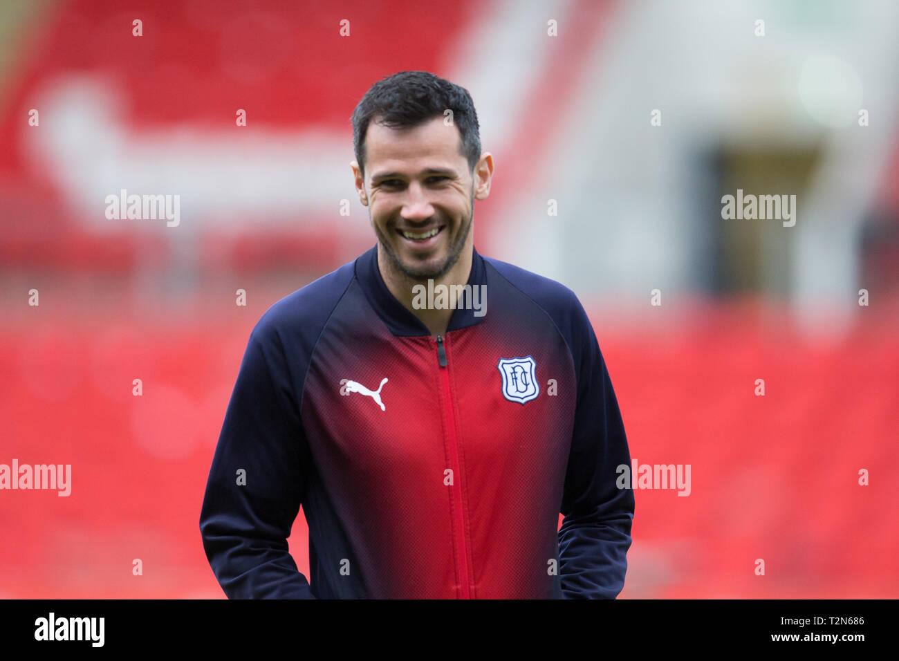 McDiarmid Park, Perth, UK. 3rd Apr, 2019. Ladbrokes Premiership football, St Johnstone versus Dundee; Ryan McGowan of Dundee inspects the pitch before the match Credit: Action Plus Sports/Alamy Live News Stock Photo