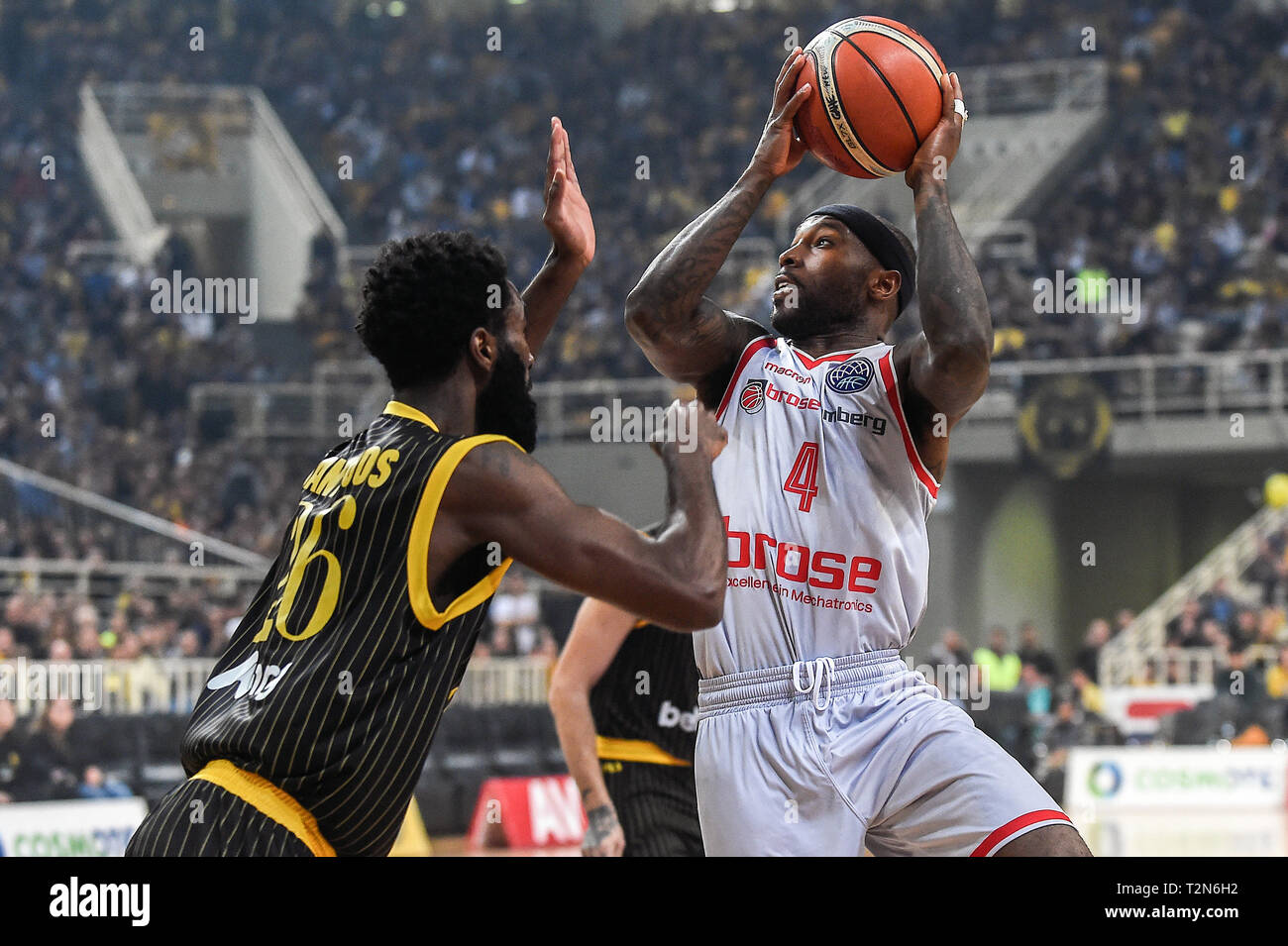 03 April 2019, Greece, Athen: Basketball: Champions League, AEK Athens -  Brose Bamberg; knockout round, quarter finals, second leg. Bambergs Tyrese  Rice (r) and Athens Howard Sant-Roos in action. Photo: Angelos  Tzortzinis/DPA/dpa