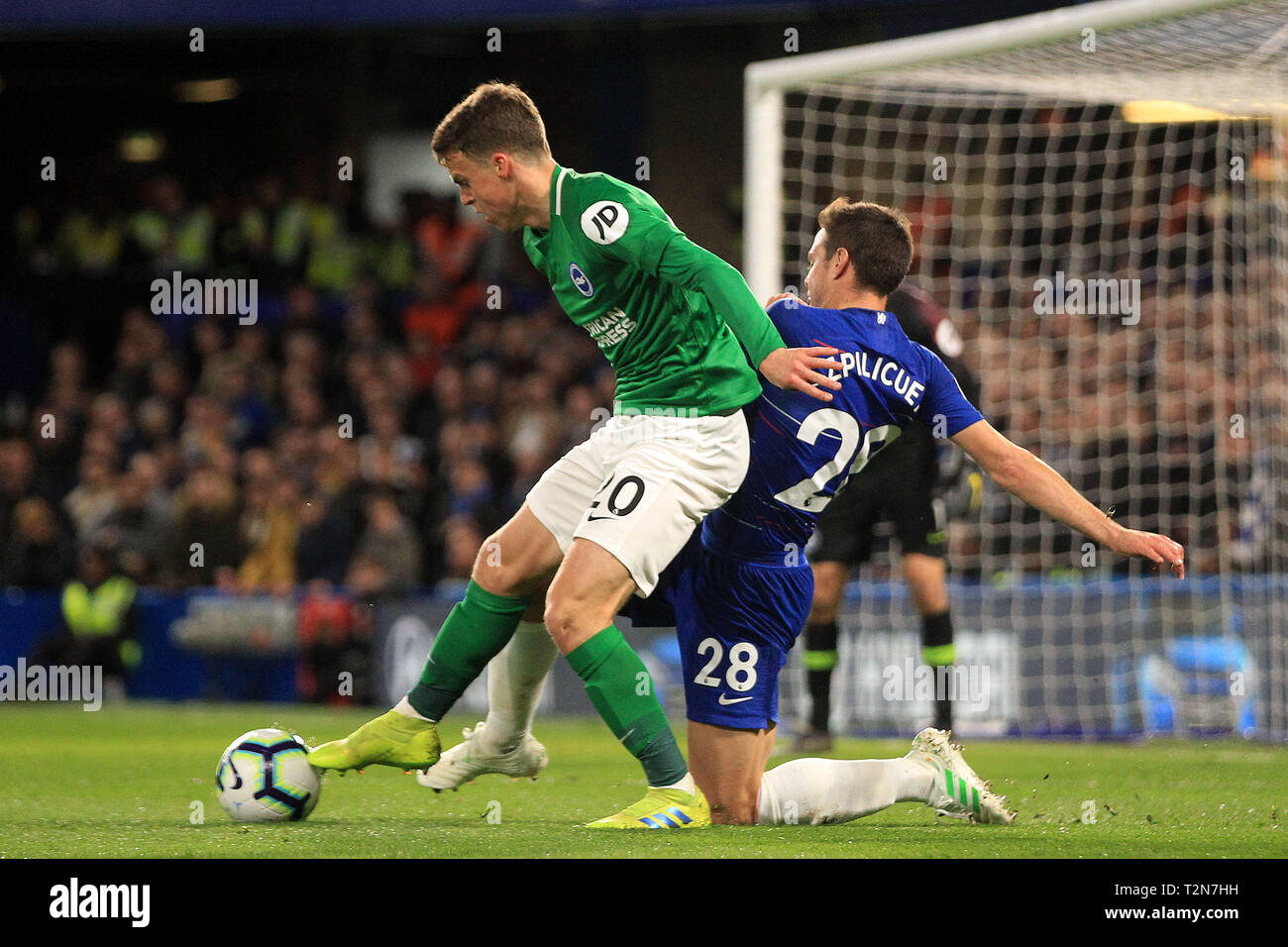 London, UK. 3rd Apr, 2019. Cesar Azpilicueta of Chelsea (R) tackles Solly March of Brighton & Hove Albion (L). Premier League match, Chelsea v Brighton & Hove Albion at Stamford Bridge in London on Wednesday 3rd April 2019. this image may only be used for Editorial purposes. Editorial use only, license required for commercial use. No use in betting, games or a single club/league/player publications. pic by Steffan Bowen/ Credit: Andrew Orchard sports photography/Alamy Live News Stock Photo