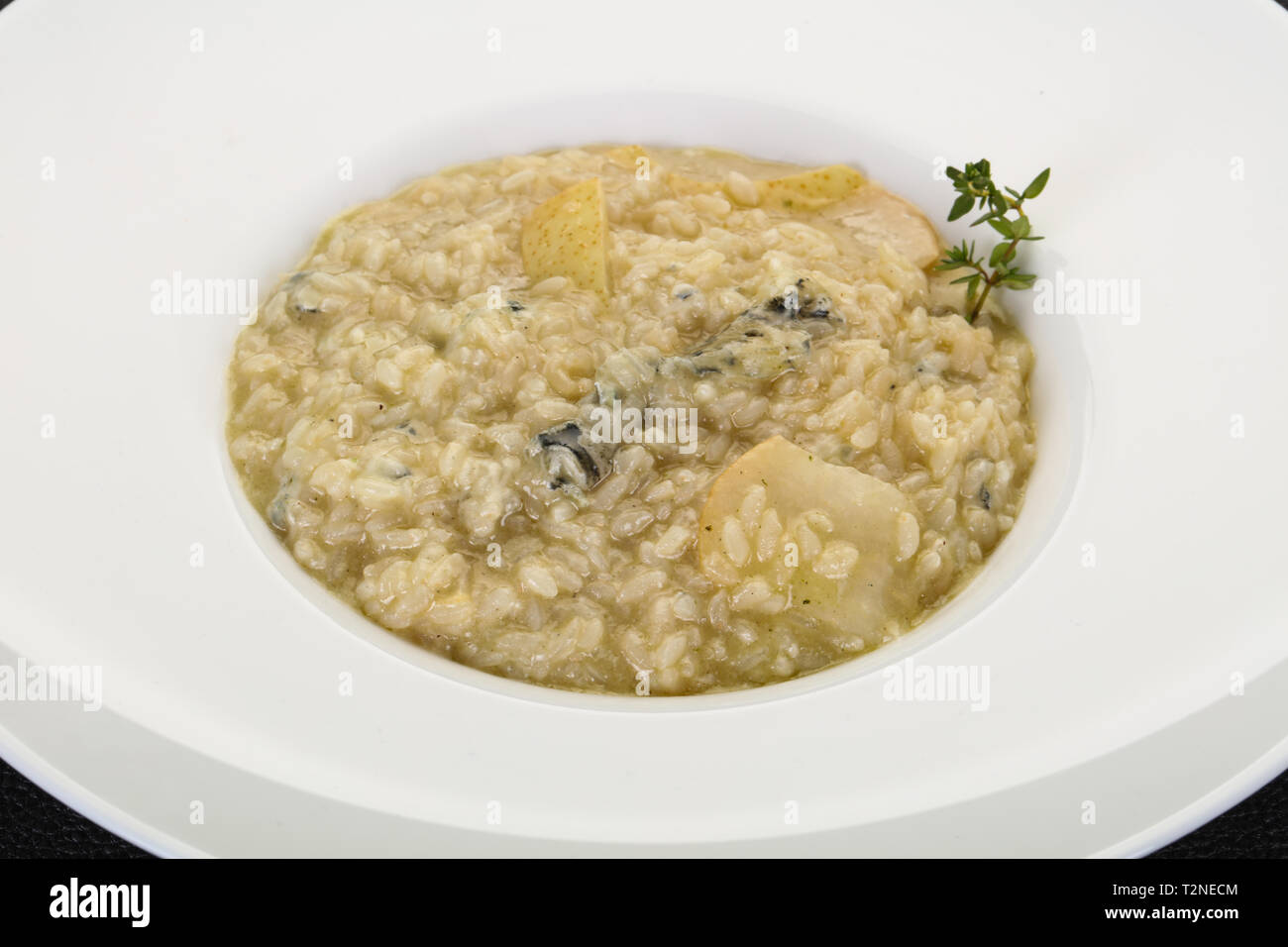 Risotto with pear and cheese Stock Photo Alamy