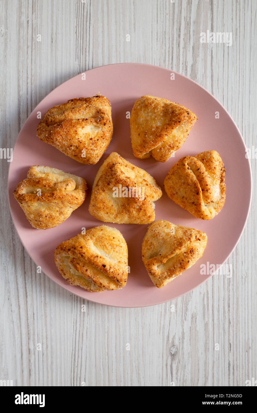 Home Baked Cottage Cheese Biscuits On Pink Plate Over White Wooden