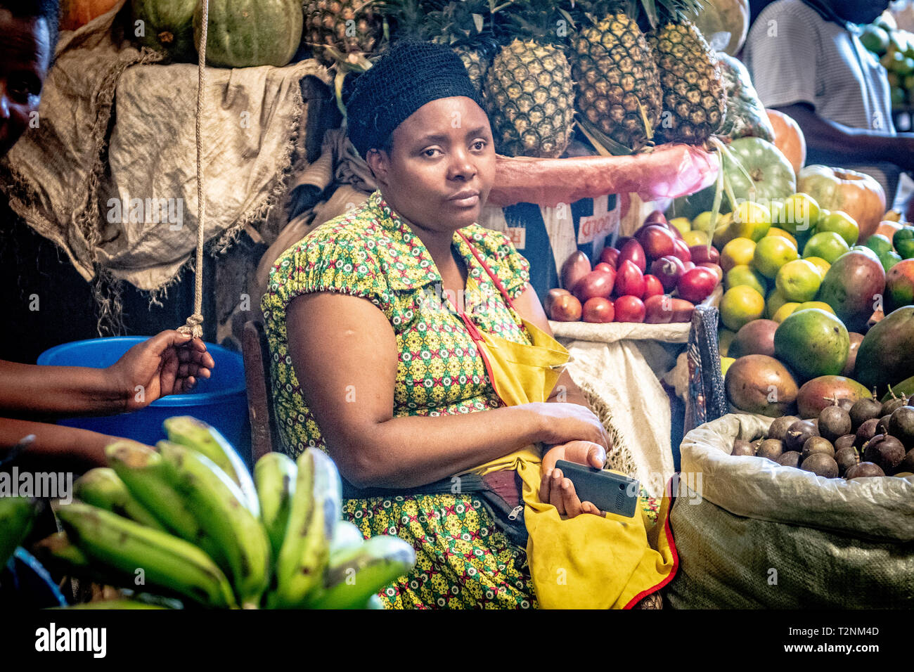 Vendor resting, Kimironko Market , Kigali Rwanda Stock Photo - Alamy