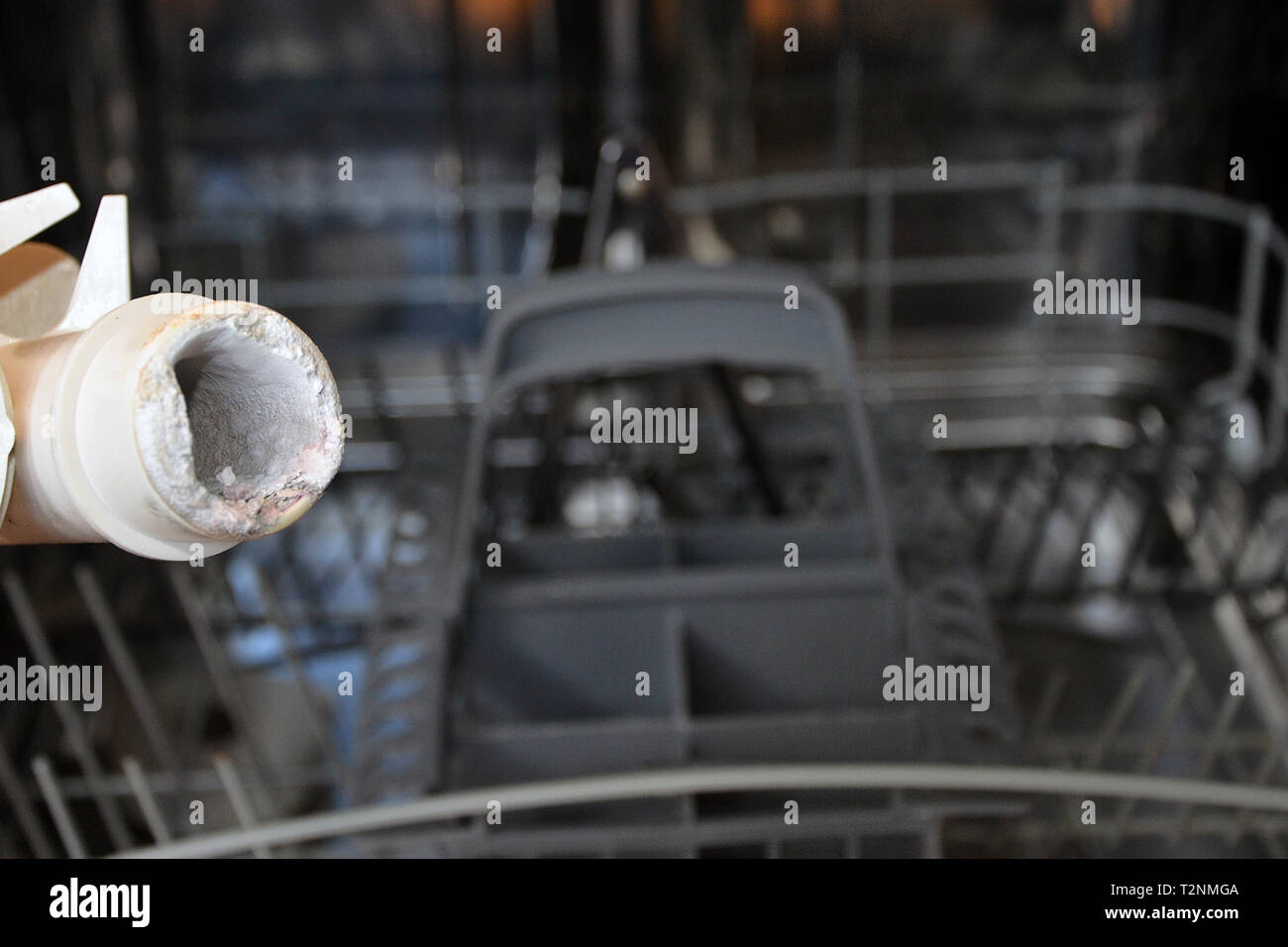limescale build up in domestic dish washer Stock Photo Alamy