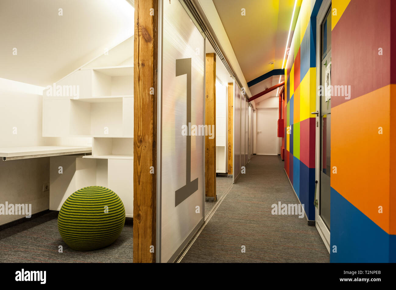 Bright colourful and minimal interior design in a business and education environment. Stock Photo