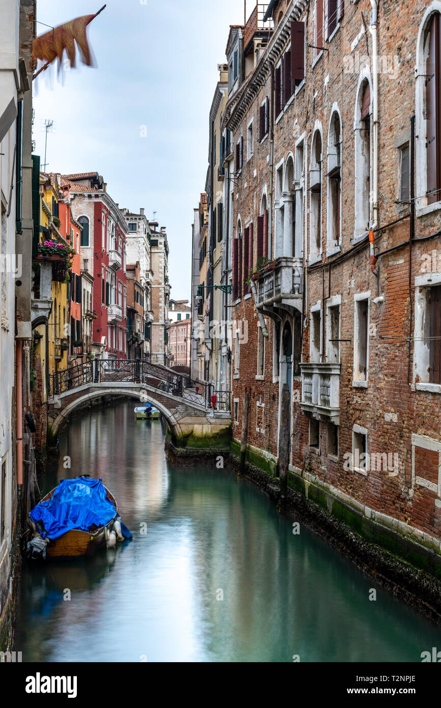 Canal in Venice with traditional old houses, Italy Stock Photo - Alamy