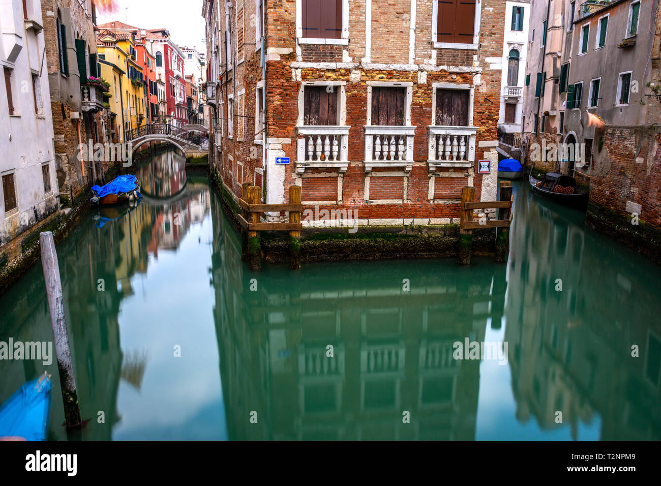 Canal in Venice with traditional old houses, Italy Stock Photo - Alamy