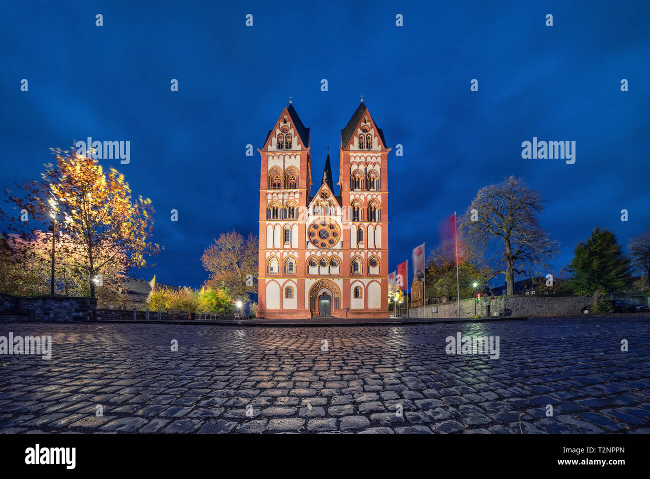 Facade of Limburg Cathedral (Dom zu Limburg) at dusk, Limburg an der Lahn, Germany Stock Photo