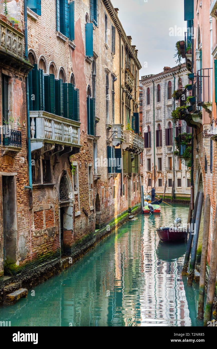 Canal in Venice with traditional old houses, Italy Stock Photo - Alamy