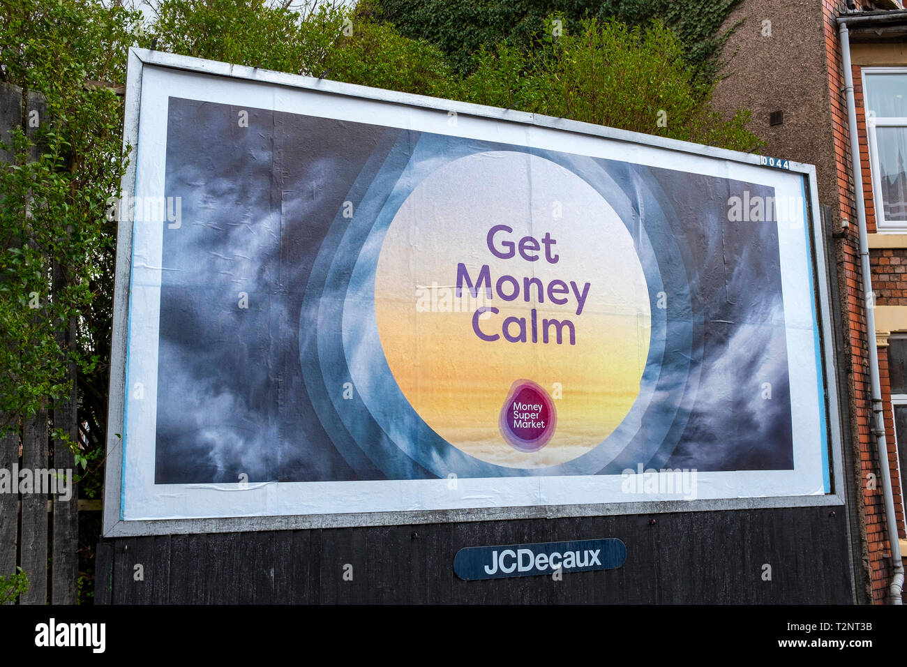 Get money calm says Money Supermarket on a billboard UK Stock Photo